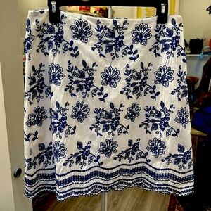 Cream and blue cotton skirt with cream polyester lining. Embroidery throughout